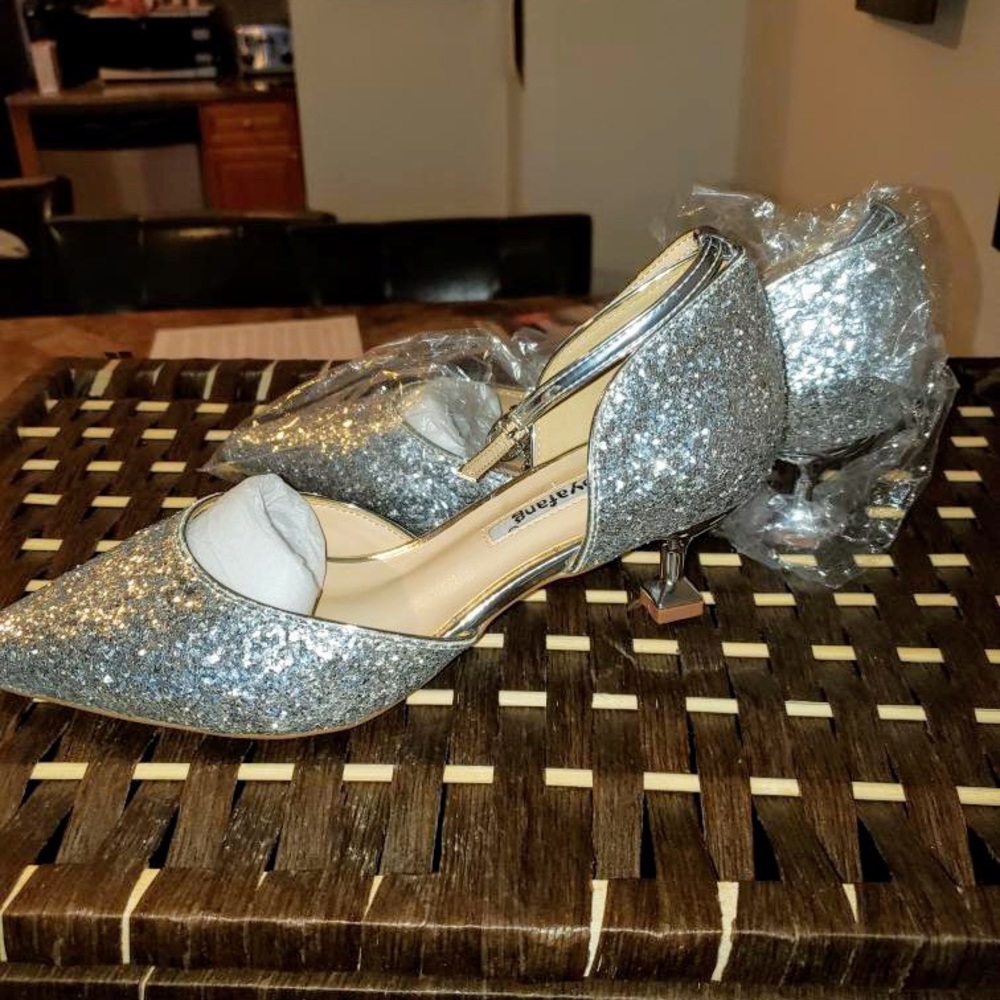 BRAND NEW never worn silver heel shoes